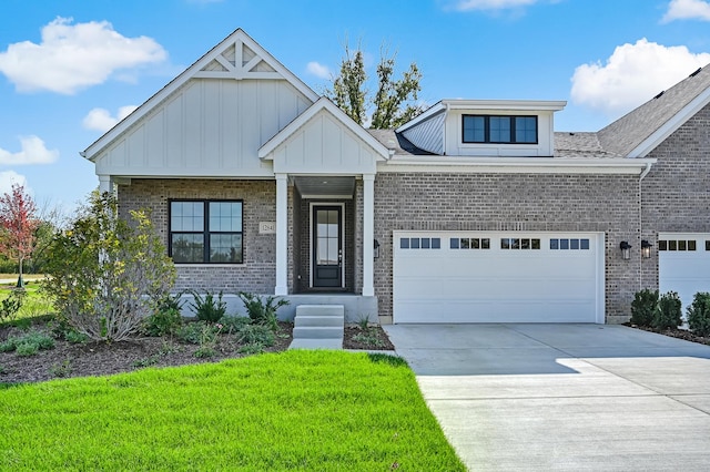 view of front of home featuring brick siding, concrete driveway, an attached garage, board and batten siding, and a front yard