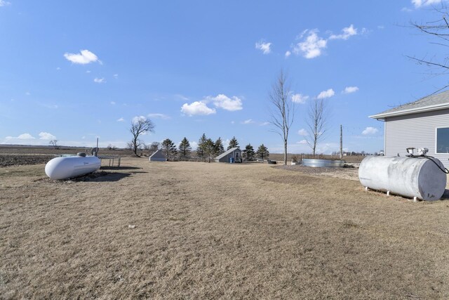 view of yard featuring heating fuel