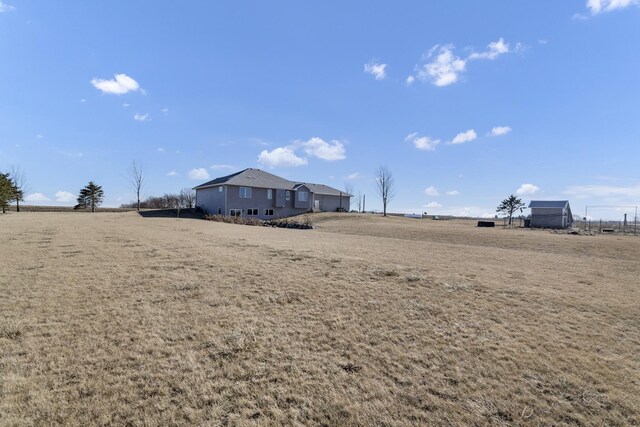 view of yard featuring a rural view