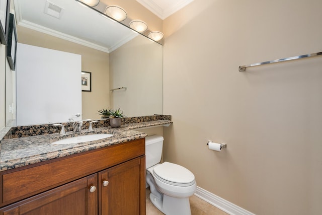 bathroom with baseboards, visible vents, toilet, ornamental molding, and vanity