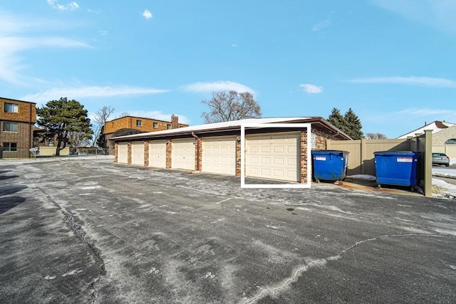 garage featuring fence