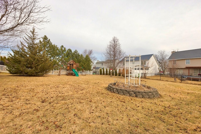 exterior space with a yard and fence