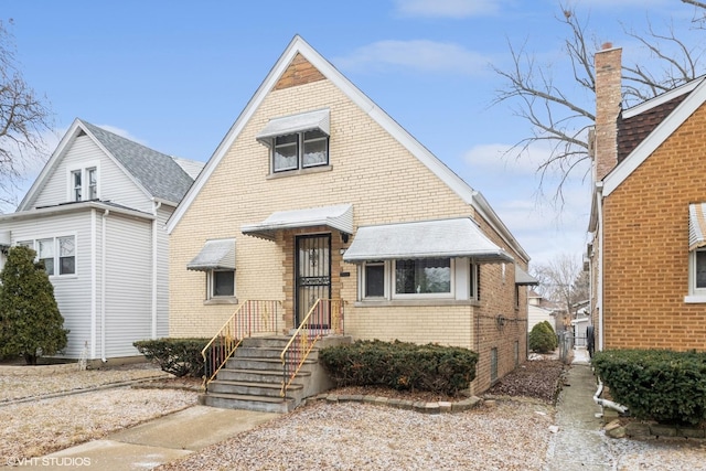 view of front of property with brick siding