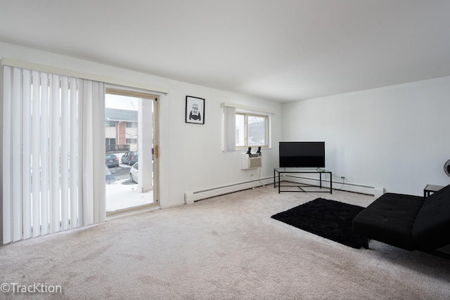 living room featuring light carpet and baseboard heating