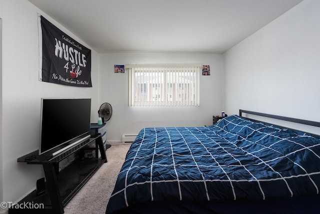 bedroom featuring a baseboard radiator, carpet flooring, and baseboards