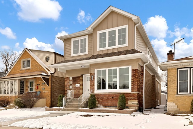 view of front facade featuring board and batten siding and brick siding