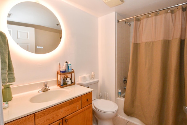 full bath with visible vents, shower / bath combo with shower curtain, vanity, and toilet