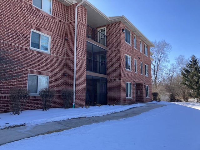 view of snow covered property