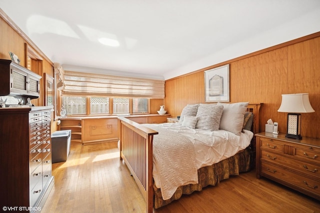 bedroom with light wood-type flooring