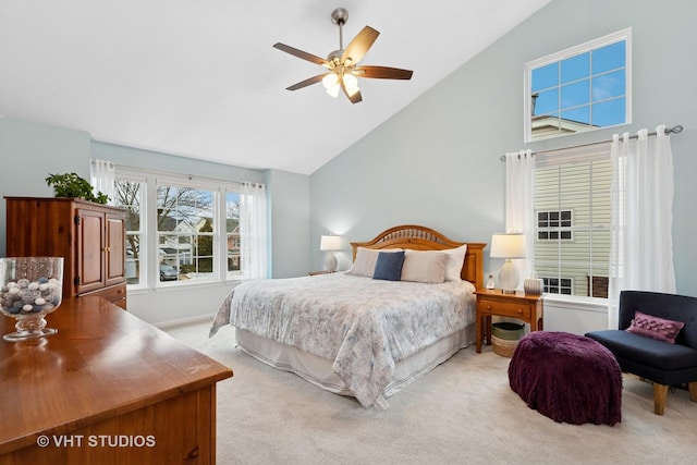 bedroom featuring light carpet, high vaulted ceiling, and ceiling fan