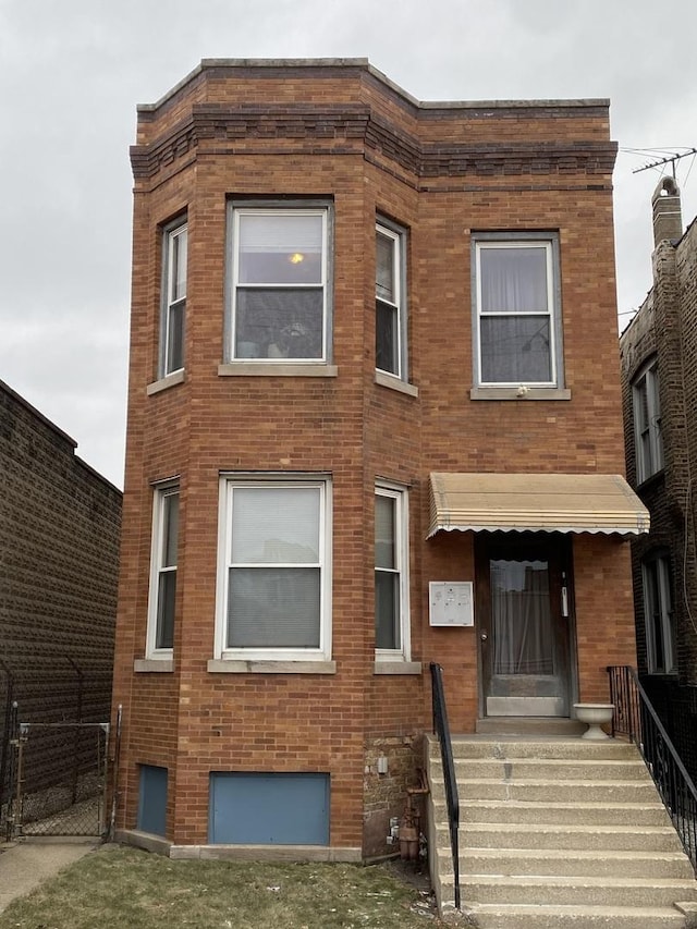 view of front facade with brick siding