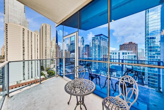 balcony featuring a city view