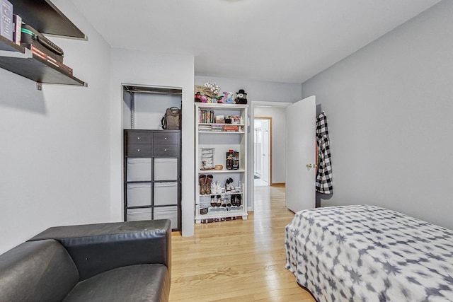 bedroom with light wood-type flooring