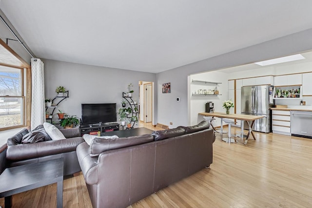 living room featuring light wood-style flooring