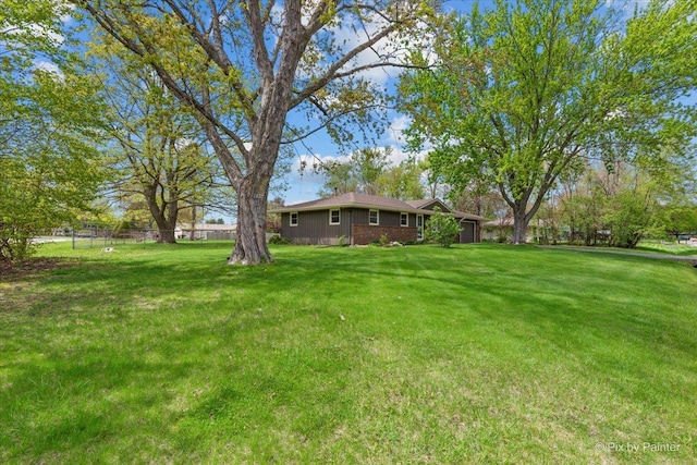 view of yard with fence
