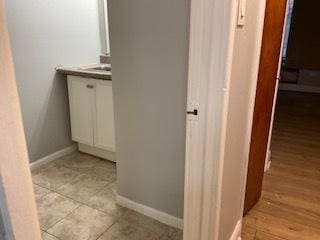 bathroom featuring baseboards