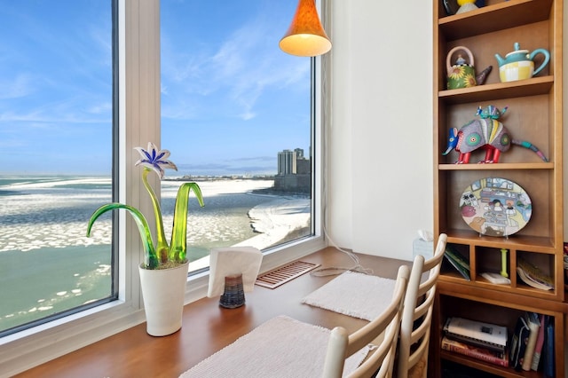 dining space with a water view