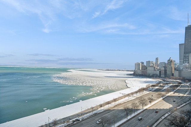 view of water feature with a view of the beach and a view of city