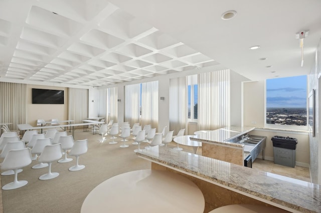 interior space featuring coffered ceiling and recessed lighting