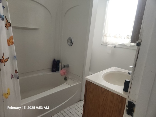 full bath featuring shower / tub combo, tile patterned flooring, and a sink