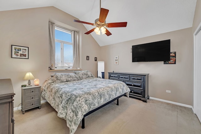 bedroom with light carpet, baseboards, and lofted ceiling