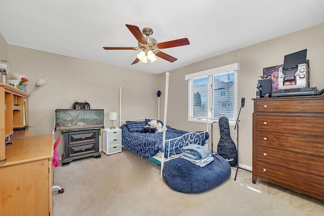 bedroom with carpet flooring and a ceiling fan