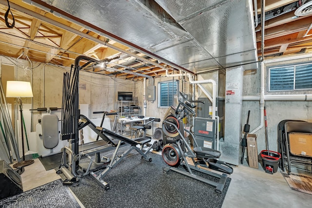 workout area featuring electric panel and visible vents