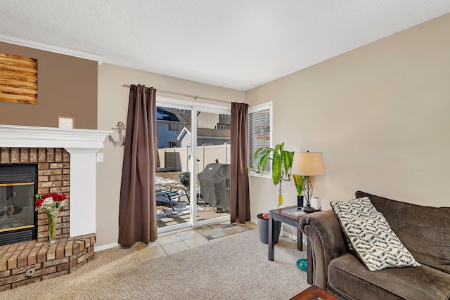 living area featuring light carpet, a fireplace, a textured ceiling, and baseboards