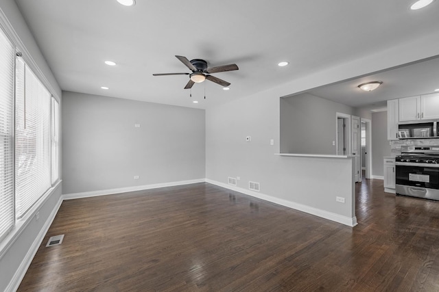 entryway featuring a healthy amount of sunlight, baseboards, and a ceiling fan