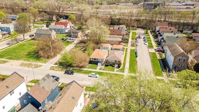 birds eye view of property with a residential view