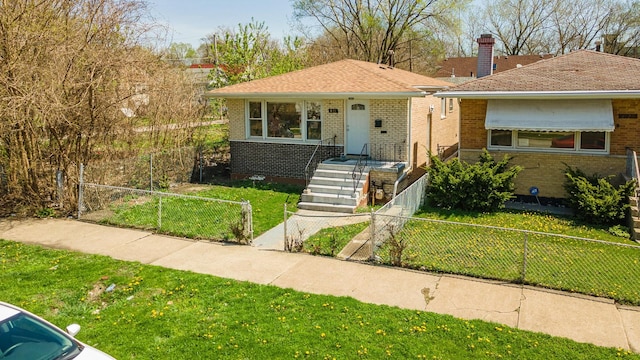 bungalow-style house with covered porch, a front yard, a chimney, brick siding, and a fenced front yard