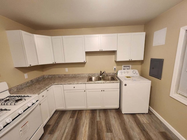 kitchen with washer / dryer, electric panel, white cabinets, white gas range, and a sink