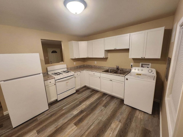 kitchen with white appliances, dark wood-type flooring, a sink, white cabinetry, and washer / dryer