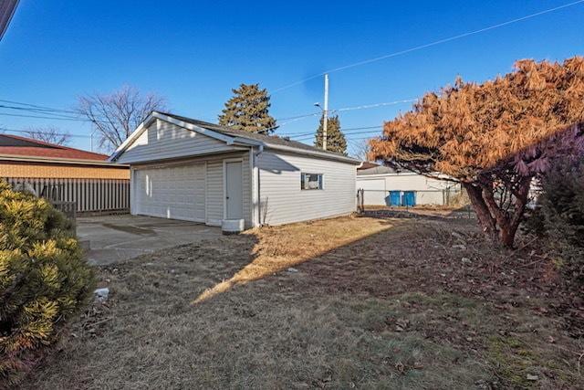 detached garage with fence