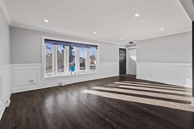 unfurnished living room with a wainscoted wall, crown molding, wood finished floors, and recessed lighting