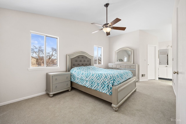 bedroom featuring light carpet, baseboards, and a ceiling fan