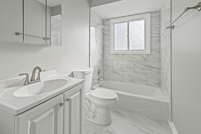 bathroom featuring toilet, marble finish floor, shower / washtub combination, and vanity