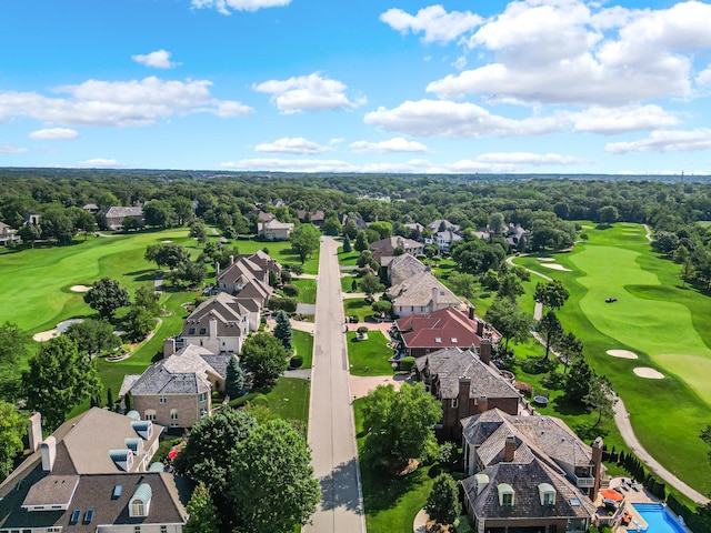 drone / aerial view featuring a residential view and view of golf course