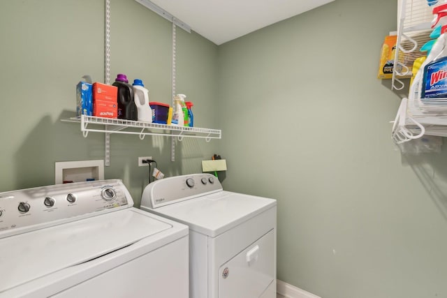 clothes washing area featuring laundry area and independent washer and dryer