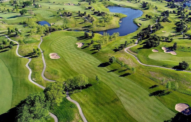 birds eye view of property featuring a water view and golf course view