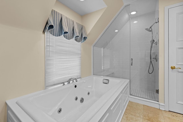 full bath with a shower stall, a whirlpool tub, and tile patterned floors