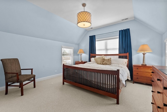 bedroom featuring visible vents, vaulted ceiling, light carpet, and baseboards
