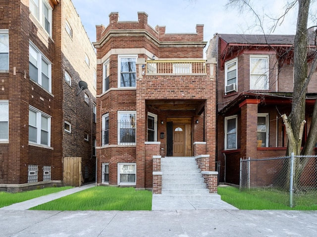 multi unit property with brick siding and fence