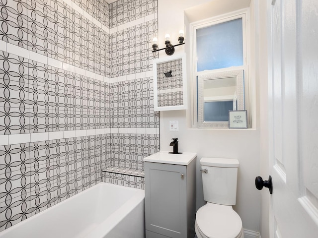 full bathroom with a washtub, vanity, and toilet