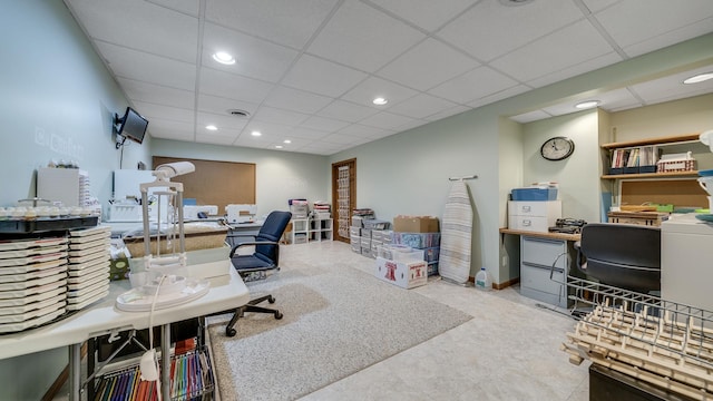 home office featuring visible vents, a drop ceiling, and recessed lighting