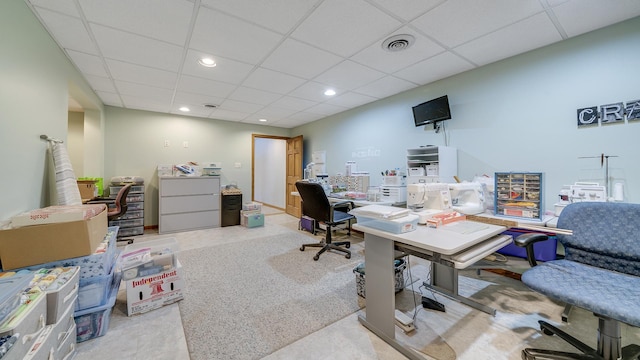 office with a drop ceiling, visible vents, and recessed lighting