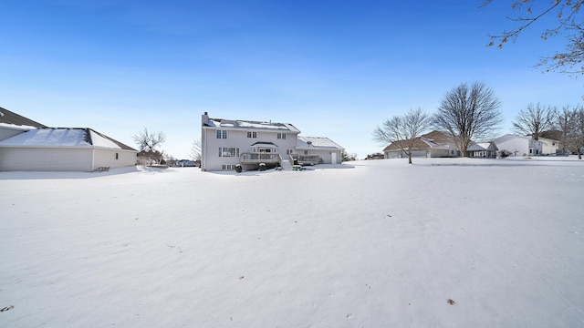 view of yard covered in snow