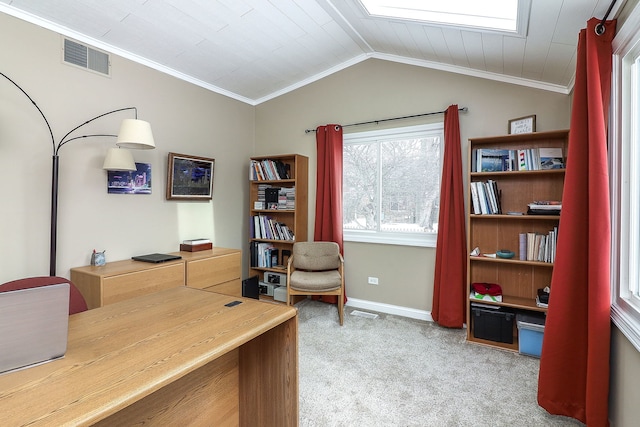 office featuring visible vents, lofted ceiling, ornamental molding, carpet floors, and baseboards