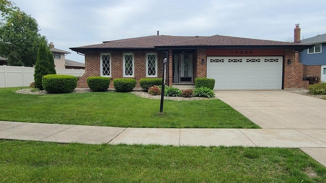 17555 Rosewood Ln, Tinley Park, IL 60487 - view of front of house with brick siding, driveway, an attached garage, and a shingled roof