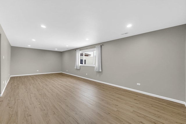 17555 Rosewood Ln, Tinley Park, IL 60487 - unfurnished room featuring light wood-style flooring and recessed lighting